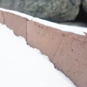 Naturstein Randstein Mainsandstein rot Limes tolle Gartenideen bei Bollerrocks Galabau