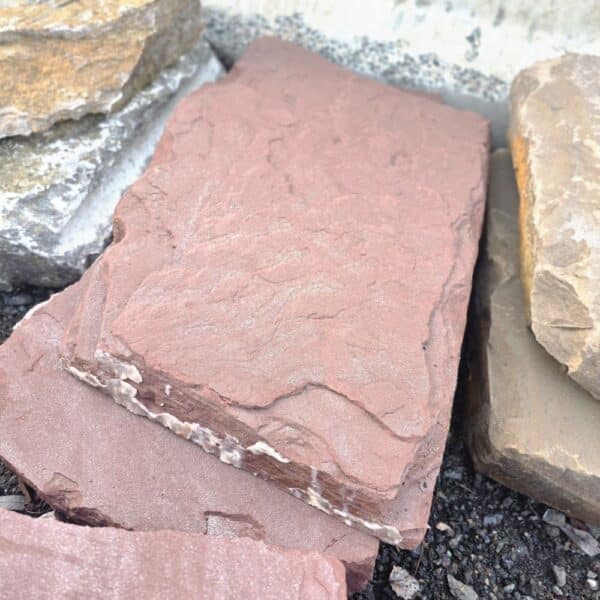 Organischer Garten kreative Gartenwege aus roten Sandstein Trittsteinen Natursteinboden schöne Umrandungen